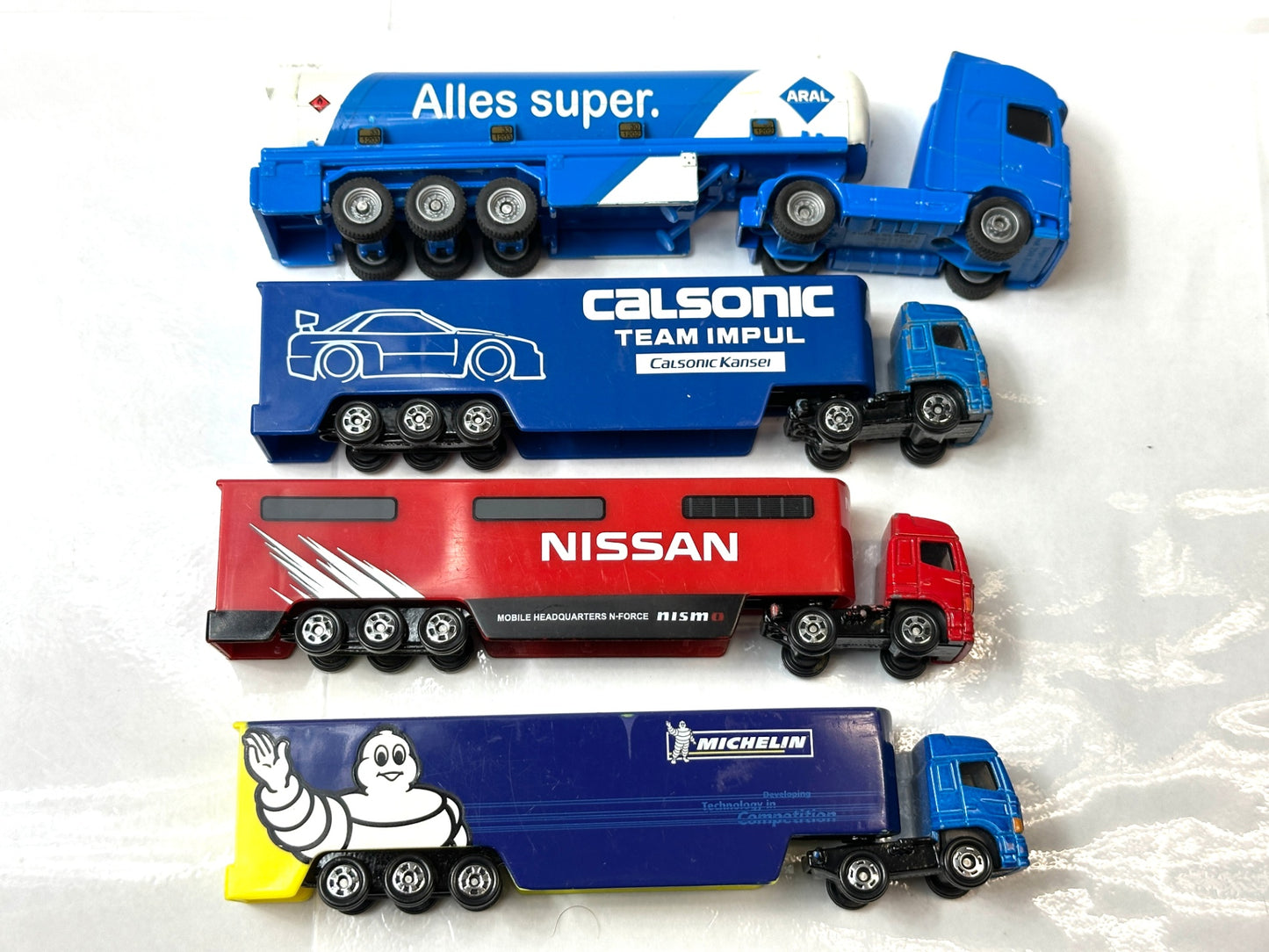 ミニカー4台セット ロングトミカ他 NISSAN ミシュラン モータースポーツ カルソニックチームインパルレーシング トランスポーター SIKU タンカートレーラー 10/3